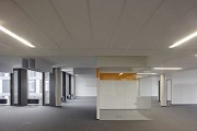 BASF Pfalzgrafenstraße: Großraumbüro mit gelbem Meeting-Cube 1