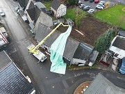 Scheuerfeld House, protection foil mounting: applying of the the protection foil