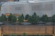 9/11 museum: elevated southern view at dusk with southern memorial-pool, zoomed