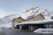 Arlberg1800: The ensemble persists of two apartment-buildings, the concert-hall and a sport-shop