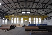 Becker steelworks, pipe hall: inner Eastern hall-unit view & gantry crane