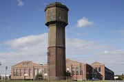 Becker steelworks, pipe hall: Southern detail-view & water tower