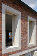 Mineral foam building, Crailsheim: the window frames were fixed in a yellow Purenit strip set in concrete