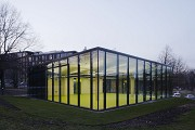 glass-cladded textile-concrete pavillon: Southeast corner at dusk