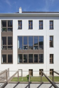 Social Economics Bank: western façade window detail