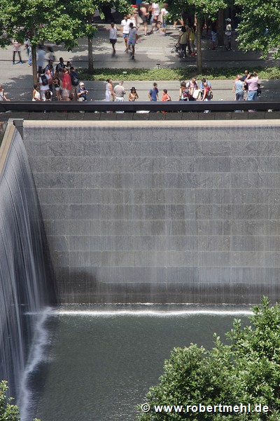 9!11 Memorial: elavated-view of falling water in north-western pool-corner