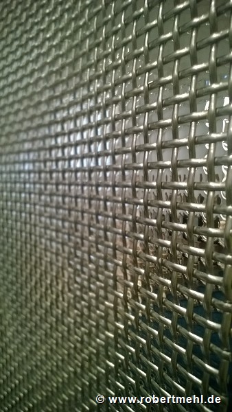 Interface at dispatch house: water-film on metal-mesh