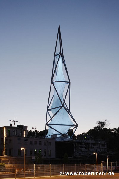 Phänomenta: illuminated tower seen from railway-station lot