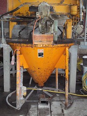 Bucket with in-house constructed agitator