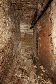 The former entrance has been closed with masonry