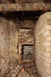 The cellar-fragment owned a fireplace